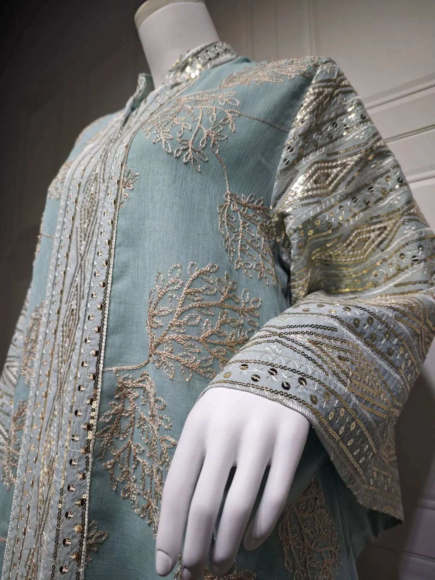 Elegant Light Green Abaya for Islamic Ladies Intricate Gold Embroidery and Tassel Accents Perfect for Festivities in Middle East
