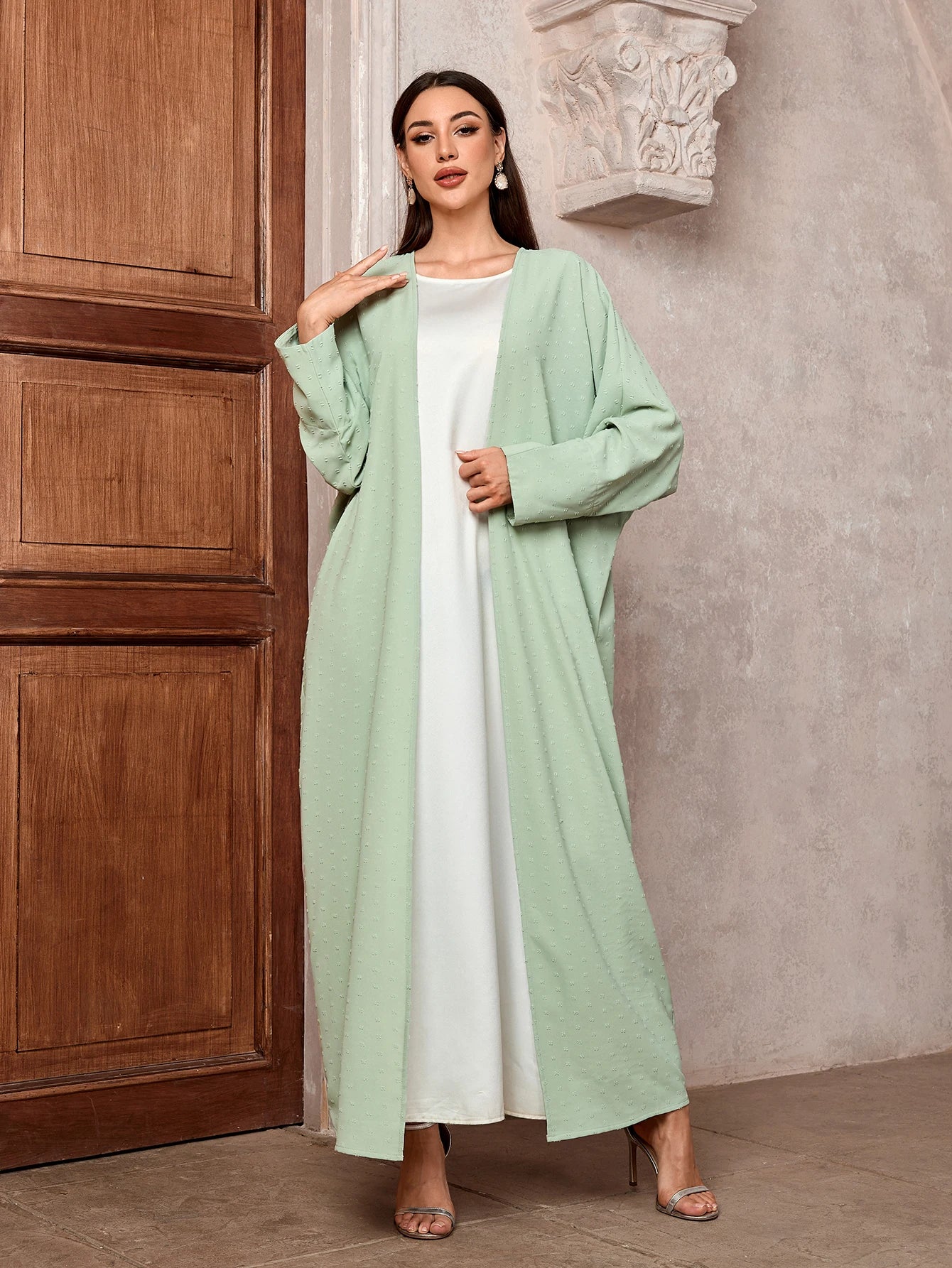 Elegant Dubai Inspired Muslim Abaya Light Green Ideal for Middle Eastern Casual Semi formal Occasions with Modest Fashion Appeal