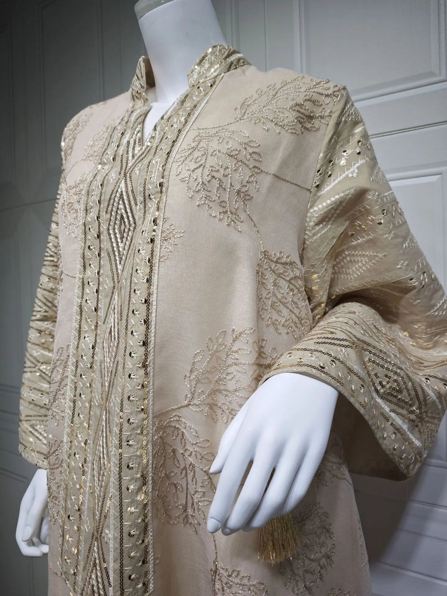 Elegant Light Green Abaya for Islamic Ladies Intricate Gold Embroidery and Tassel Accents Perfect for Festivities in Middle East