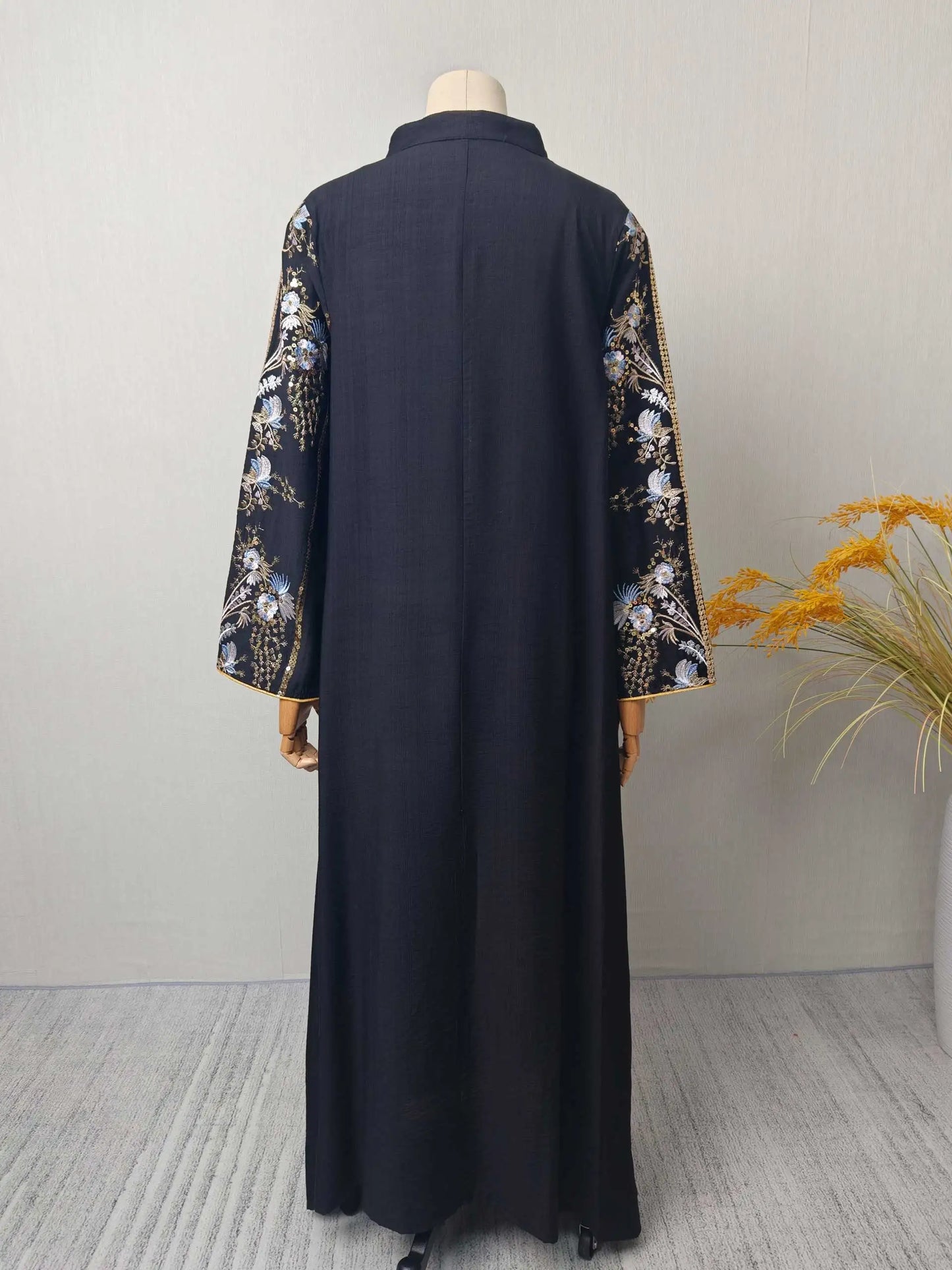 Black Muslim Abaya with Stand-Collar V-Neck Exquisite Blue-White Floral Embroidery Gold Accents Ideal for Ramadan Gatherings