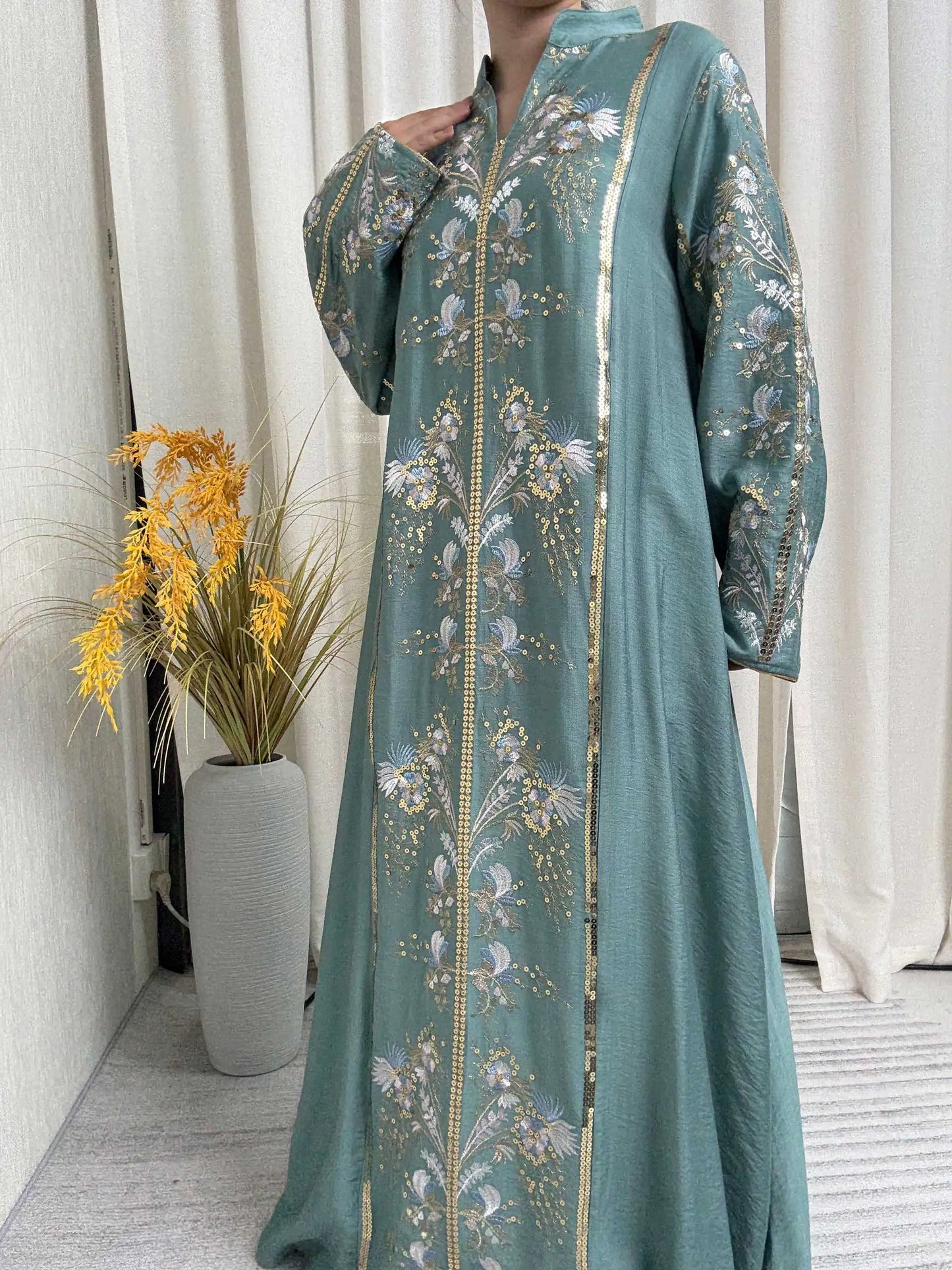 Black Muslim Abaya with Stand-Collar V-Neck Exquisite Blue-White Floral Embroidery Gold Accents Ideal for Ramadan Gatherings