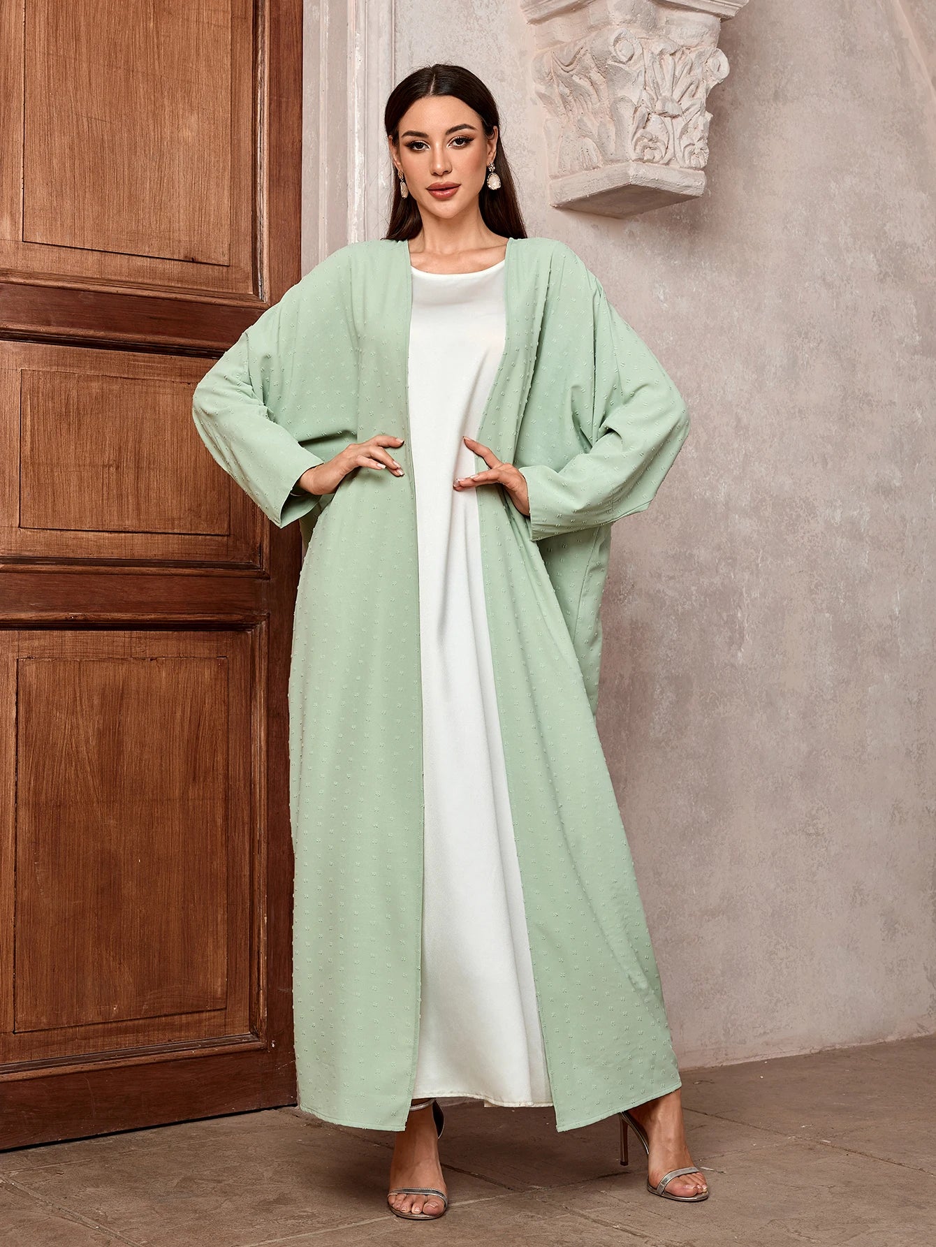Elegant Dubai Inspired Muslim Abaya Light Green Ideal for Middle Eastern Casual Semi formal Occasions with Modest Fashion Appeal