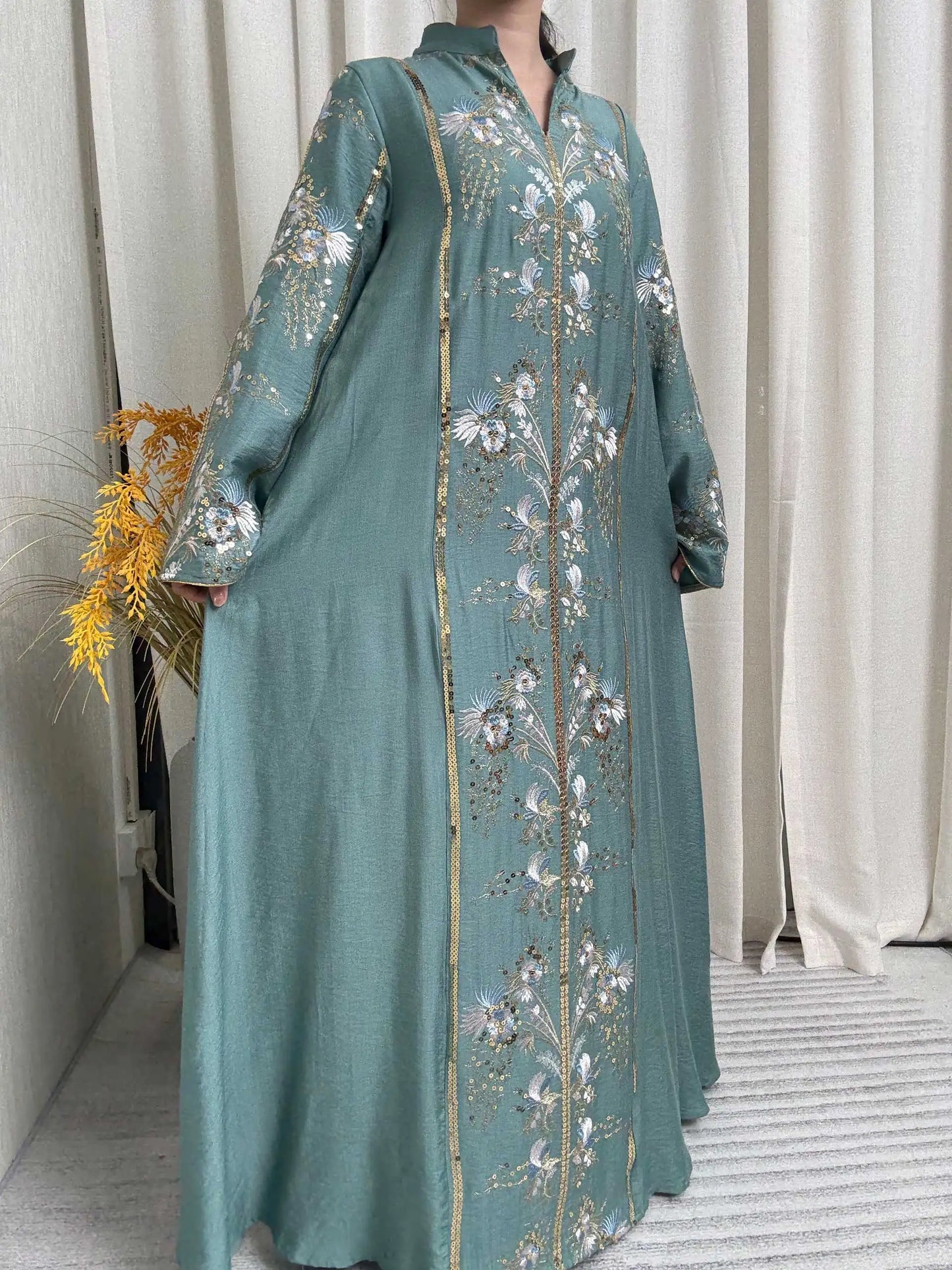 Black Muslim Abaya with Stand-Collar V-Neck Exquisite Blue-White Floral Embroidery Gold Accents Ideal for Ramadan Gatherings