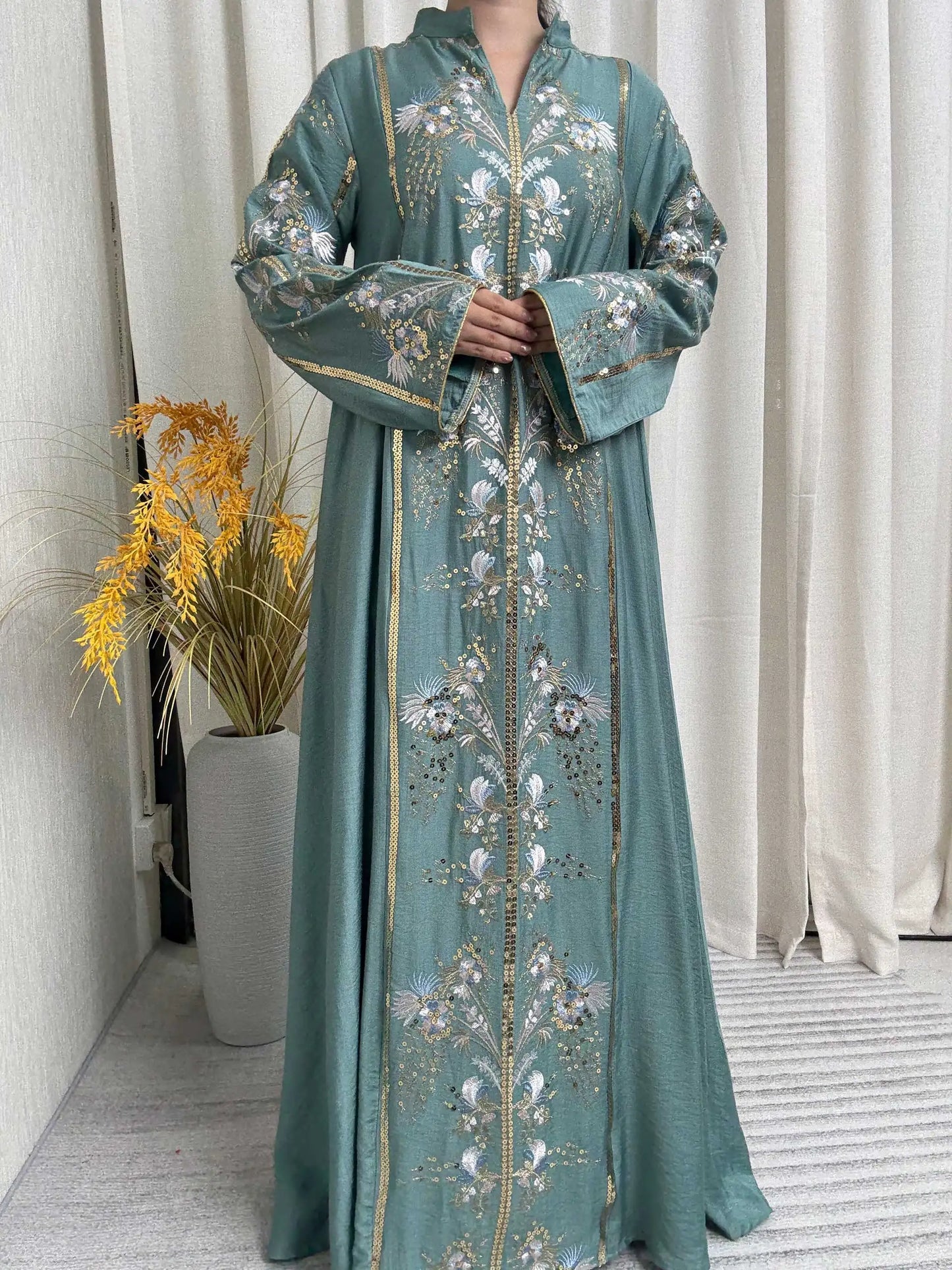 Black Muslim Abaya with Stand-Collar V-Neck Exquisite Blue-White Floral Embroidery Gold Accents Ideal for Ramadan Gatherings
