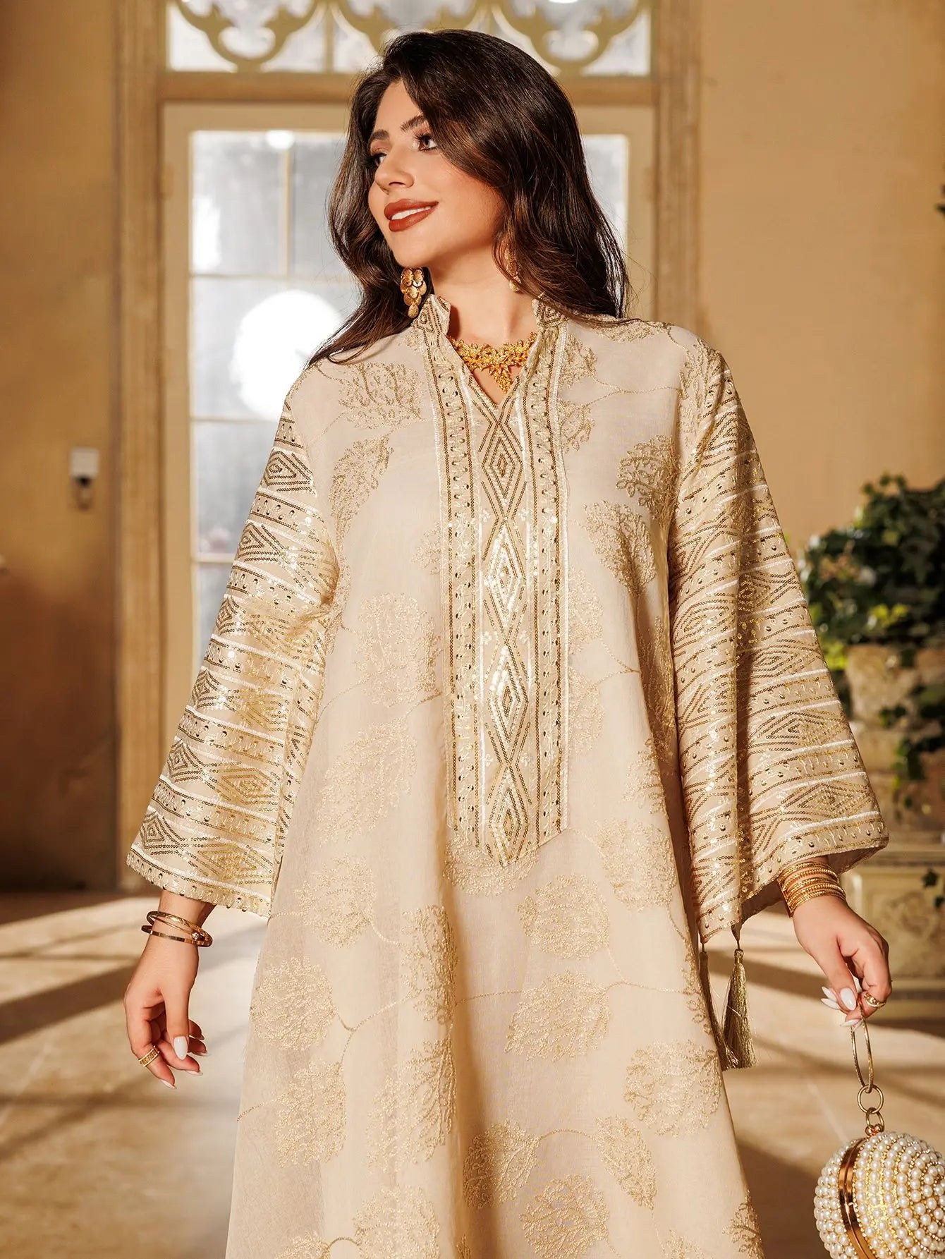 Elegant Light Green Abaya for Islamic Ladies Intricate Gold Embroidery and Tassel Accents Perfect for Festivities in Middle East