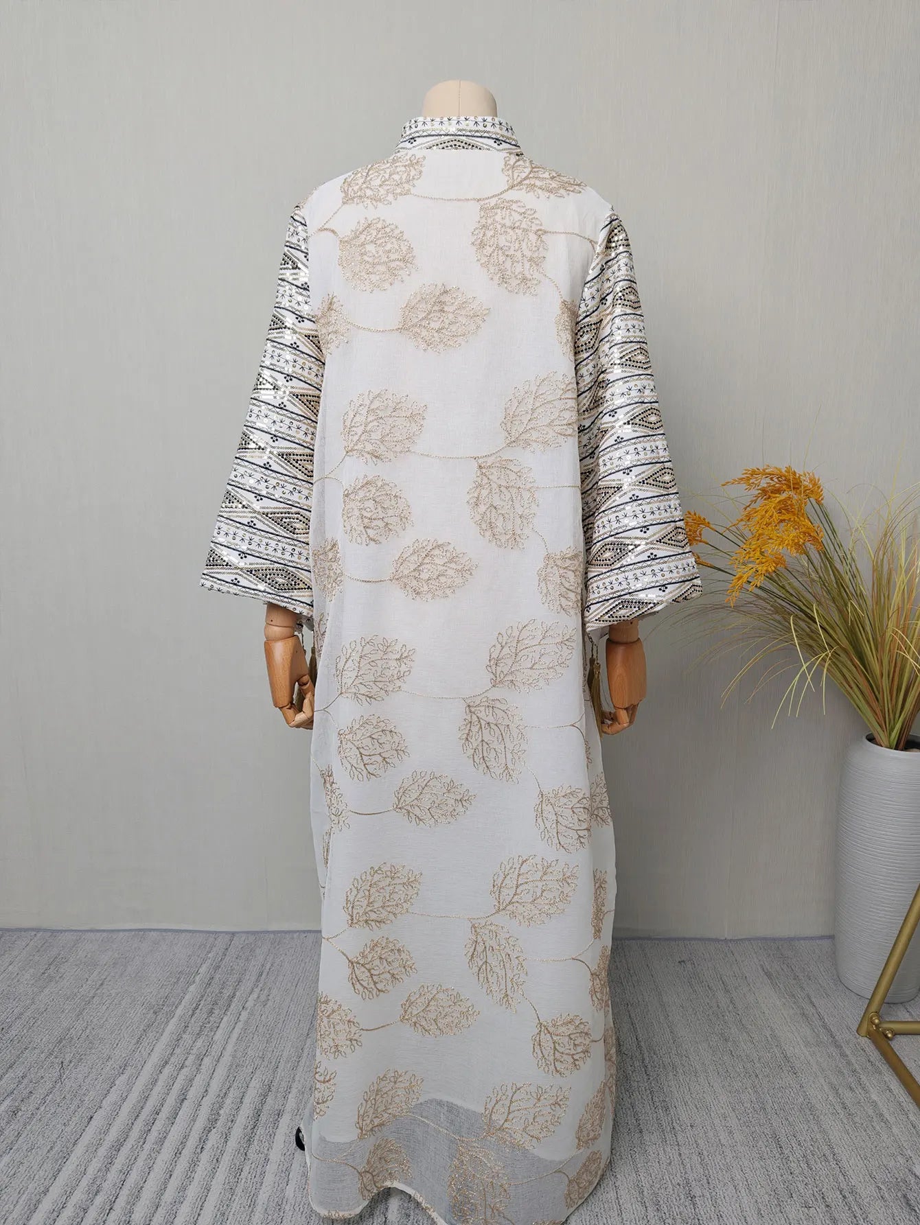 Elegant Light Green Abaya for Islamic Ladies Intricate Gold Embroidery and Tassel Accents Perfect for Festivities in Middle East