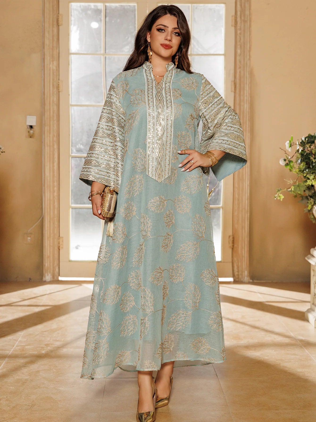 Elegant Light Green Abaya for Islamic Ladies Intricate Gold Embroidery and Tassel Accents Perfect for Festivities in Middle East