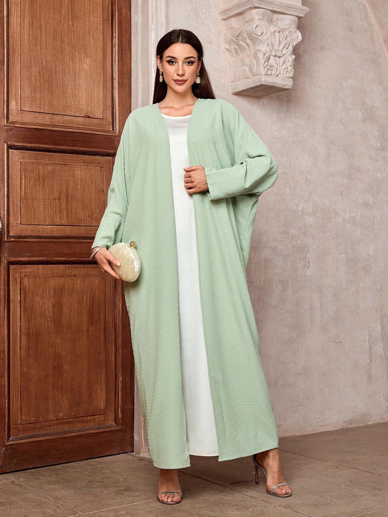 Elegant Dubai Inspired Muslim Abaya Light Green Ideal for Middle Eastern Casual Semi formal Occasions with Modest Fashion Appeal