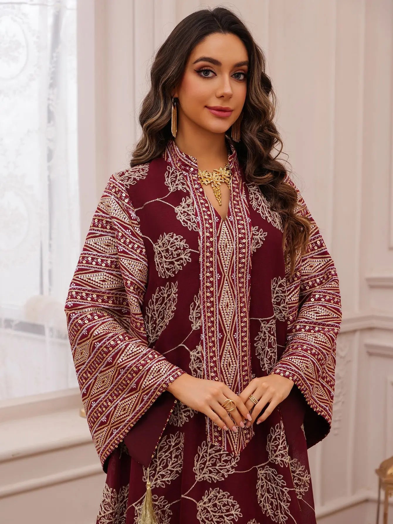 Elegant Light Green Abaya for Islamic Ladies Intricate Gold Embroidery and Tassel Accents Perfect for Festivities in Middle East