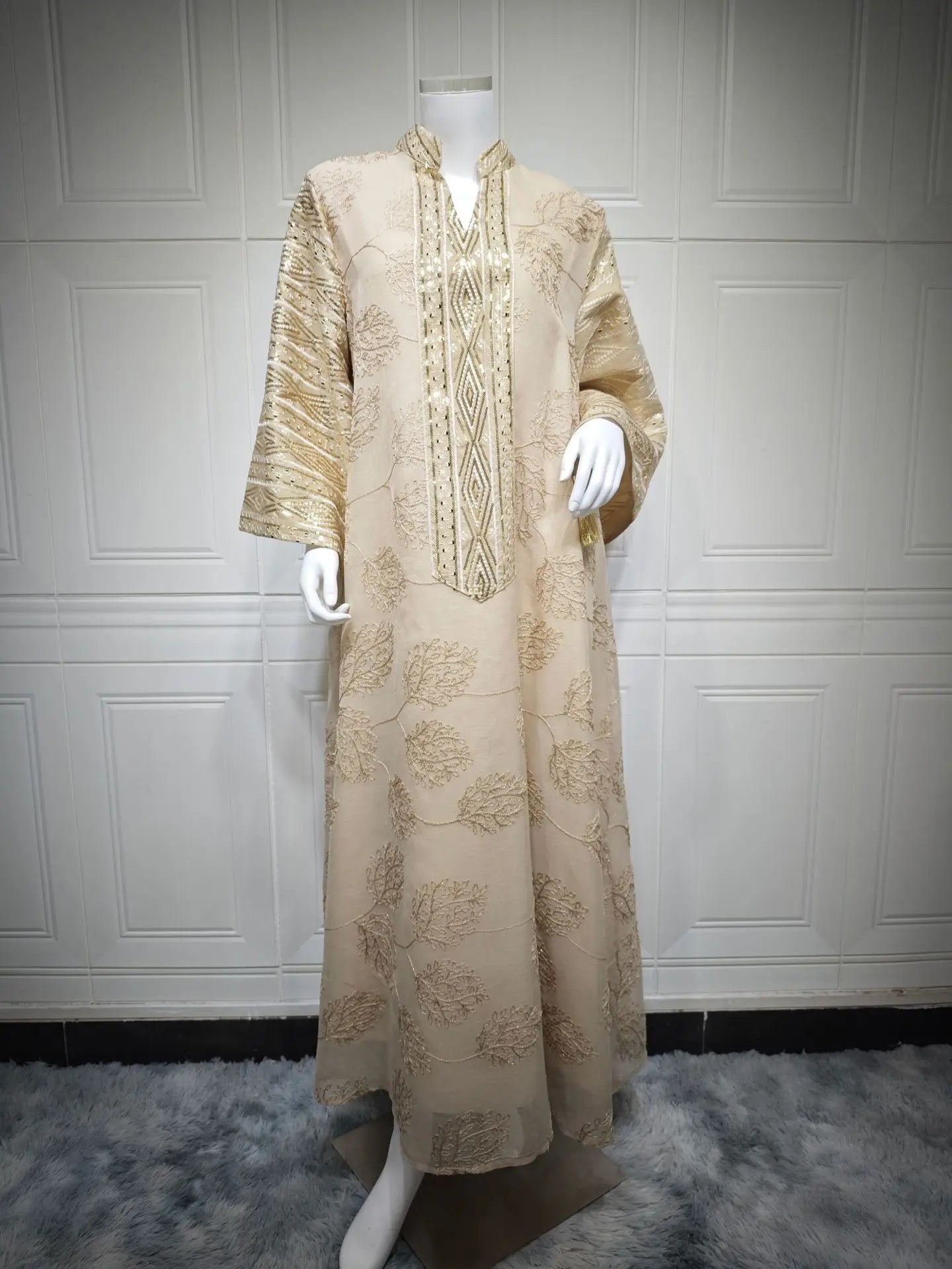 Elegant Light Green Abaya for Islamic Ladies Intricate Gold Embroidery and Tassel Accents Perfect for Festivities in Middle East